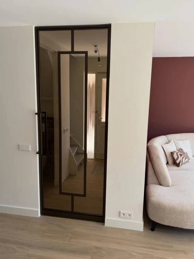 Stalen taatsdeur in Anodic Brown met brons glas